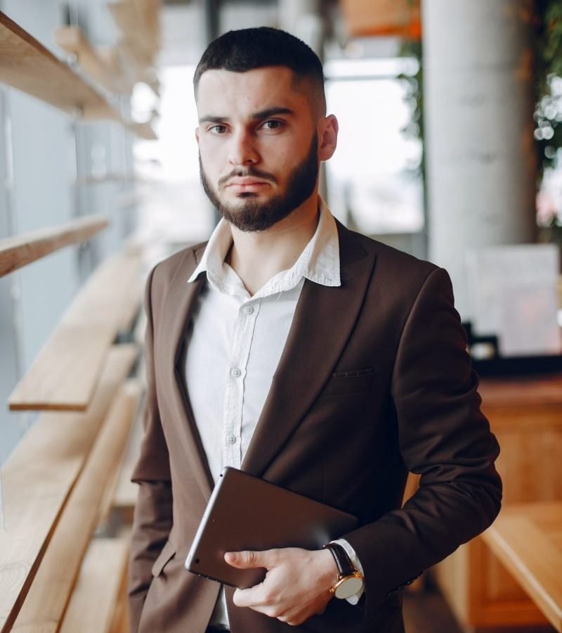 businessman-working-in-a-office-p8ji6wfbuxooc4fytypxeax3grl7ouhtfcb6z2y9ko.jpg